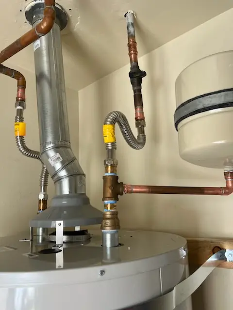 Water heater installation and plumbing repair in Queensborough