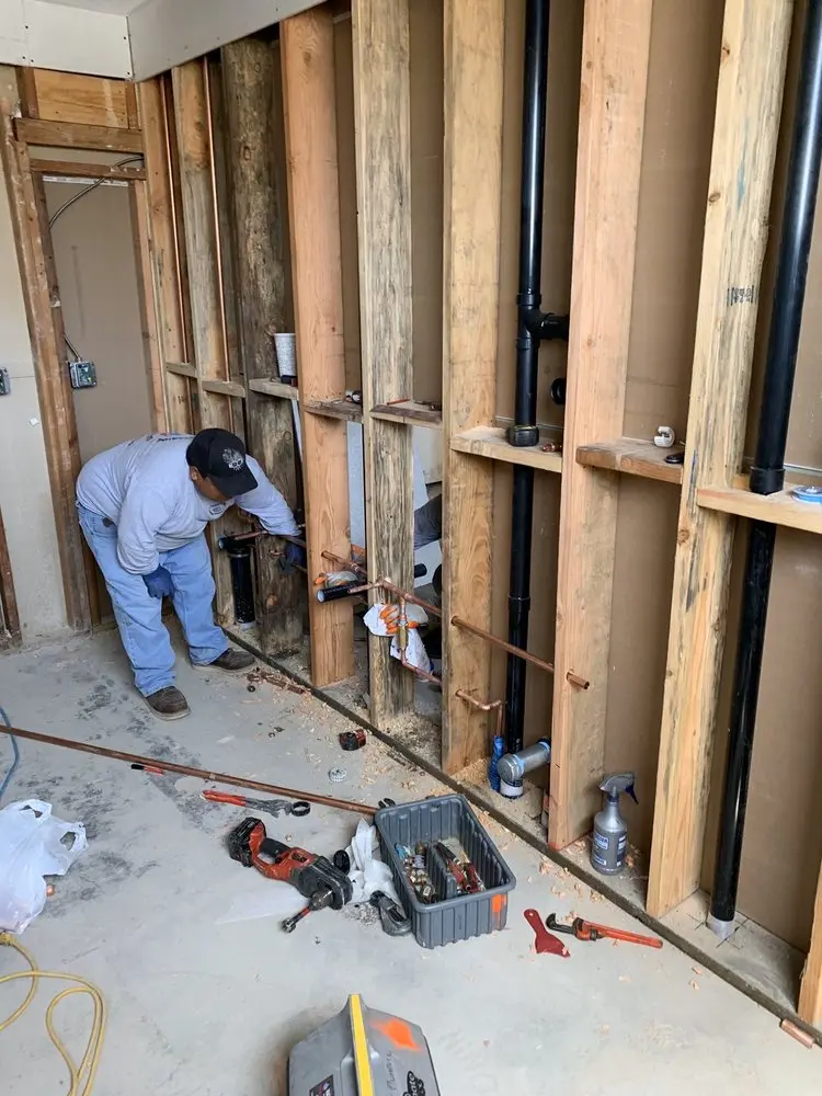 Commercial rough-in plumbing for Water Heater Replacement in Queensborough